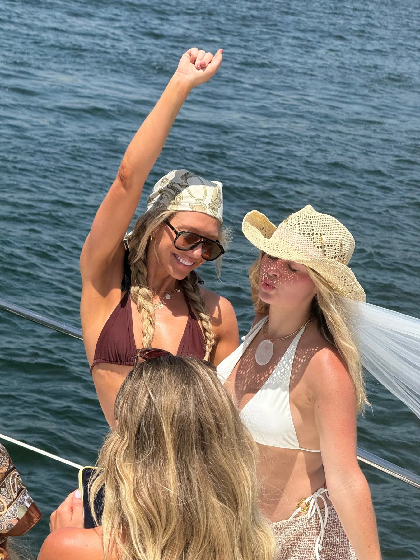 Friends enjoying a celebration on the yacht