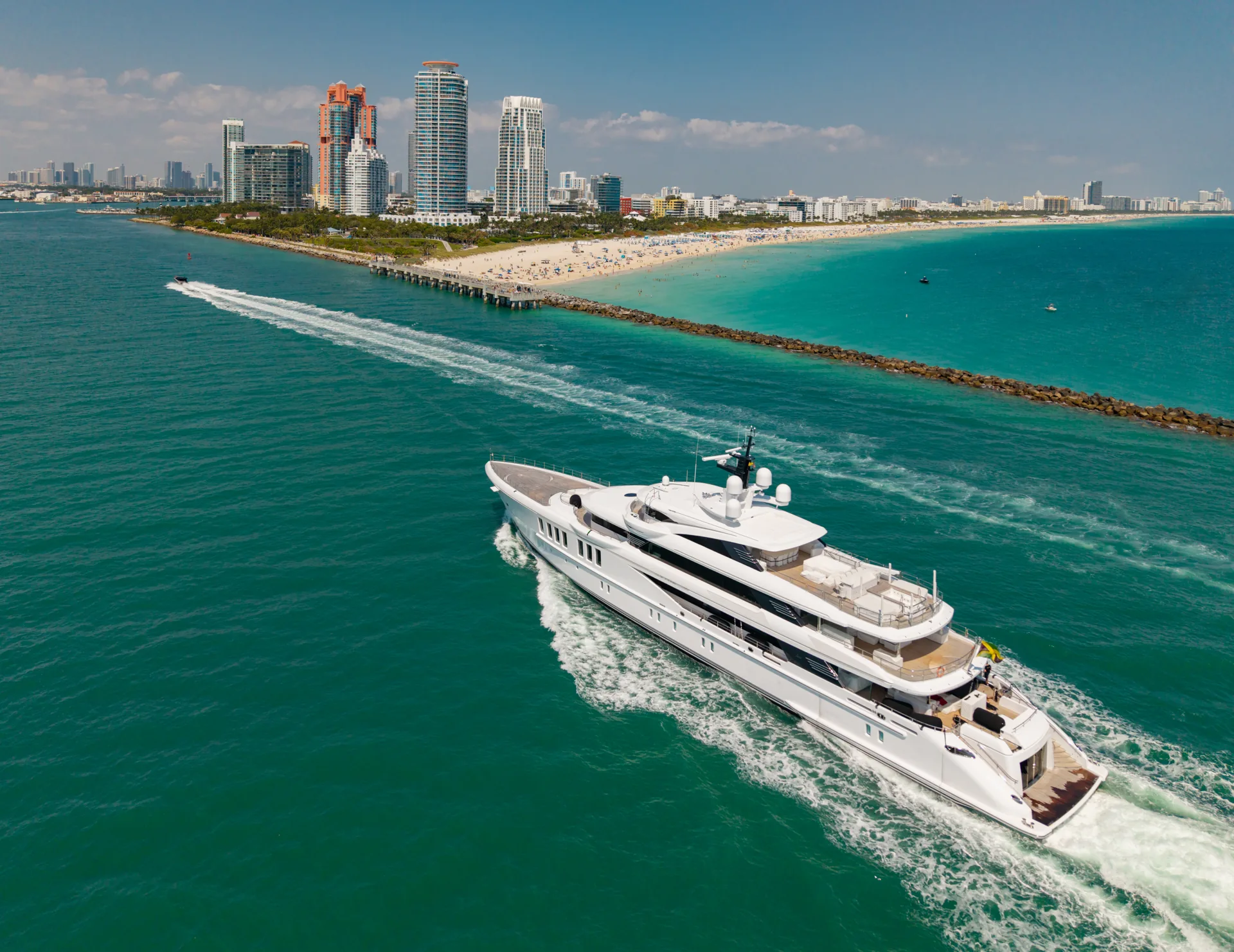 A yacht cruising beside the South Florida coastline